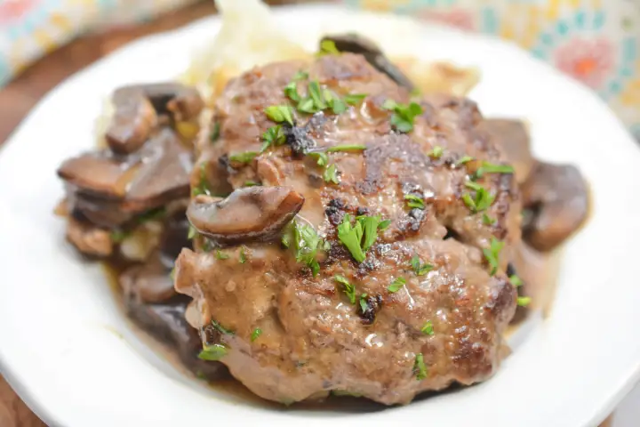 SALISBURY STEAK WITH MASHED POTATOES AND MUSHROOM GRAVY